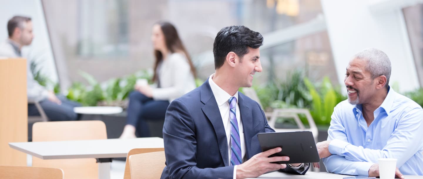 merrill financial solutions advisor with client