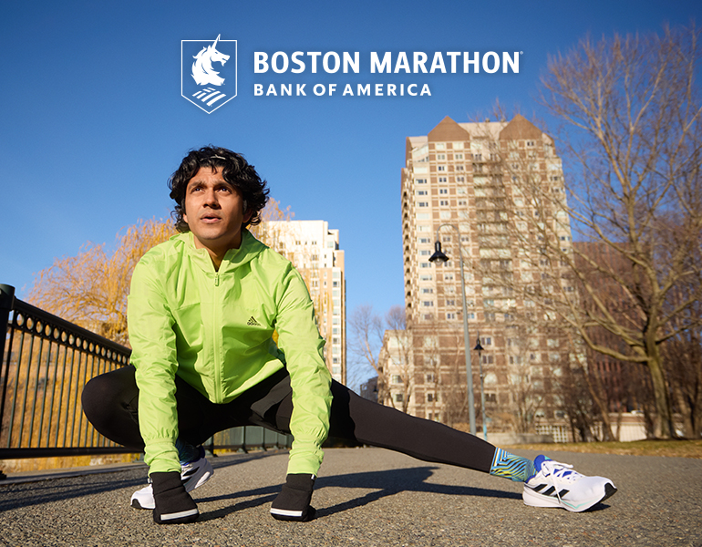 Runner stretching and Boston Marathon Bank of America Logo