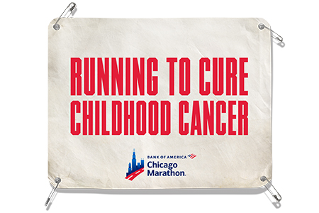 Bib reading: “RUNNING TO CURE CHILDHOOD CANCER”