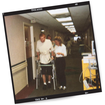 A polaroid image of Martin doing physical therapy