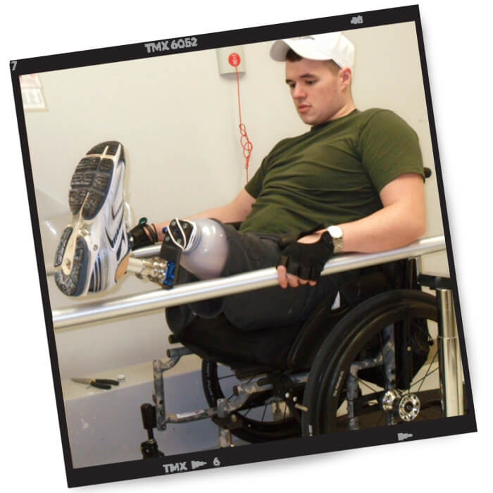 A polaroid image of Zach doing physical therapy