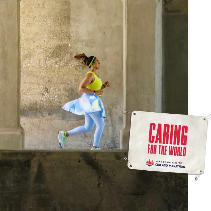 Qaiynat running with an image of a bib that reads “CARING FOR THE WORLD”