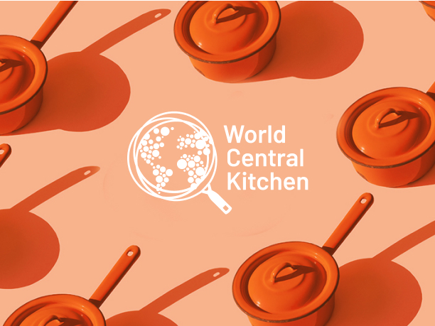 An image of cooking pots with the World Central Kitchen logo