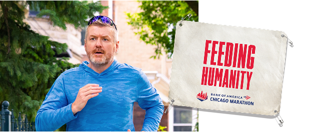 Nate running with a bib alongside him that reads “feeding humanity”