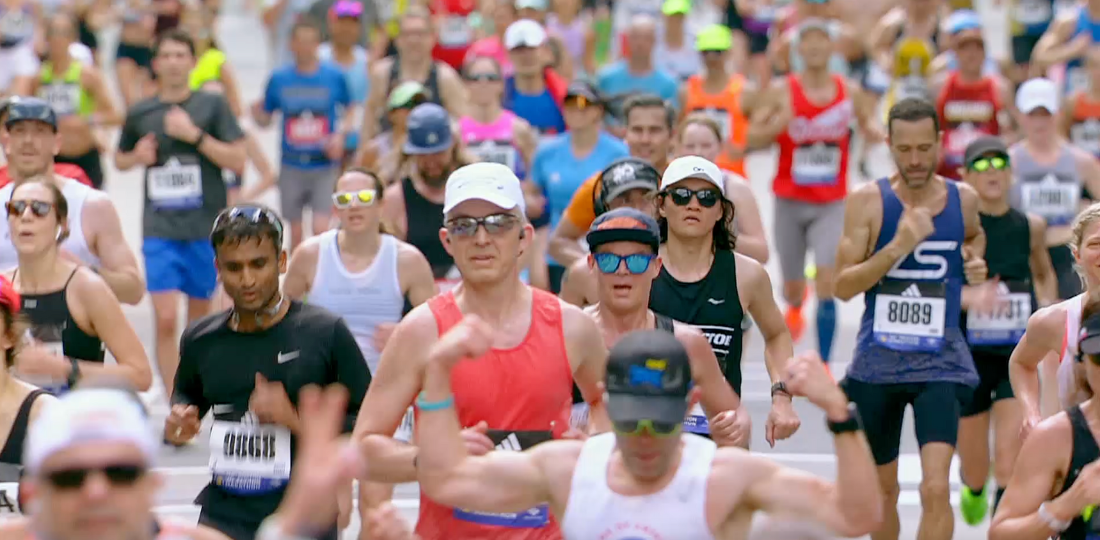 Group of people running the Boston Marathon