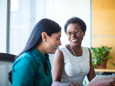 advisor and client laughing 