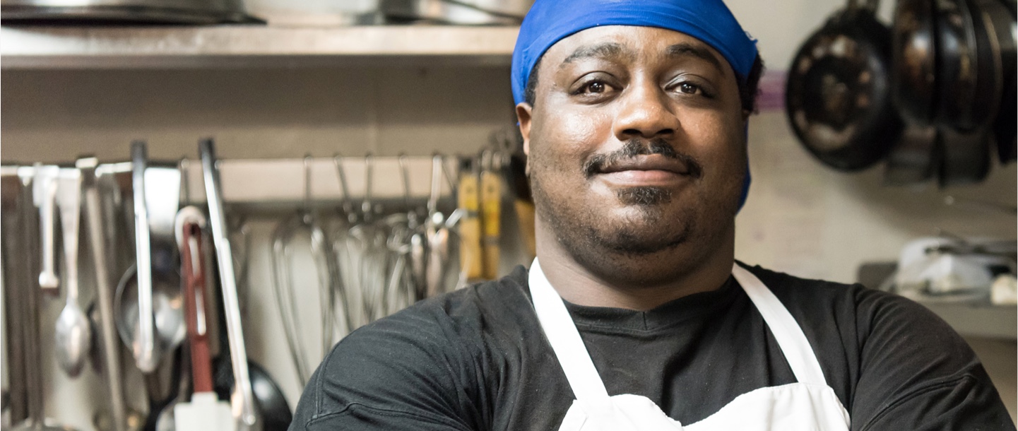 african american chef smiling