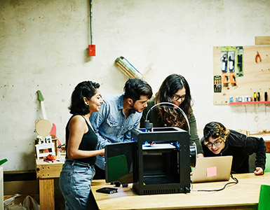 people looking at computer