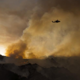 Helicopter flying over fire