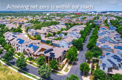 Bird’s-eye view of a neighborhood. Text reads, “Achieving net-zero is within our reach.”