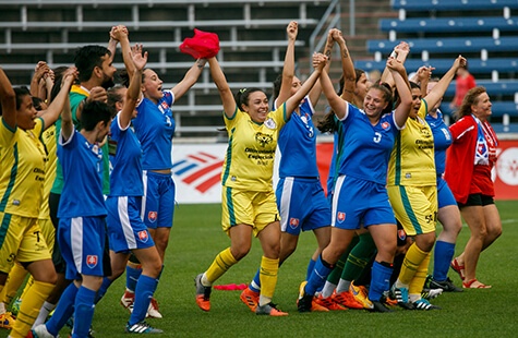 Athletes celebrate after winning a game