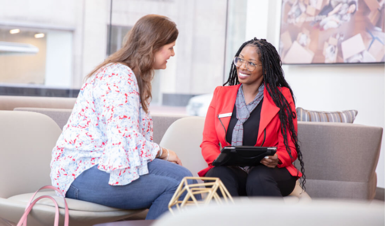 Bank of America employee helping client