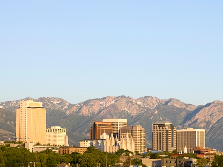 Skyline view of Salt Lake City with buildings and mountains