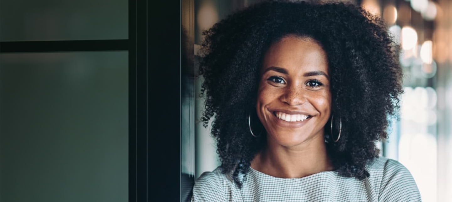 Close-up of a smiling woman Bank of America employee