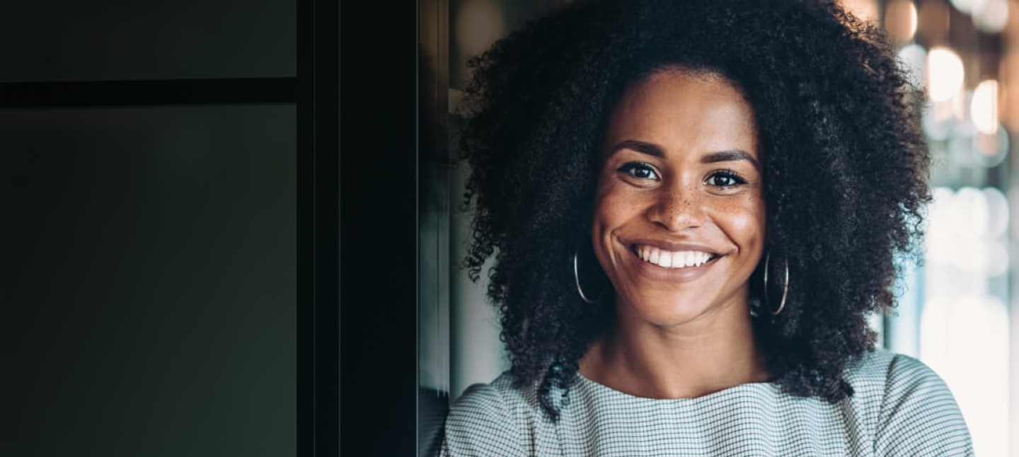 Close-up of a smiling woman Bank of America employee