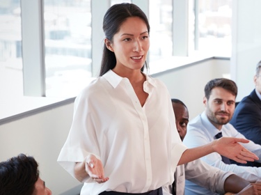 Woman speaking in meeting