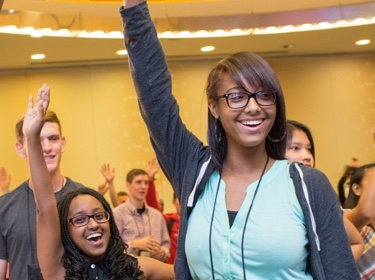 Students raising their hands