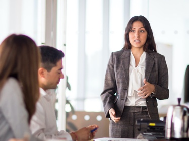 Woman leading meeting