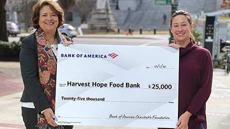 Bank of America employees presenting donation check