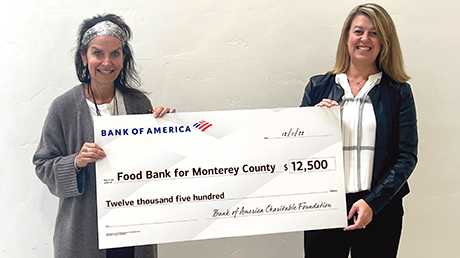 Bank of America employees presenting donation check