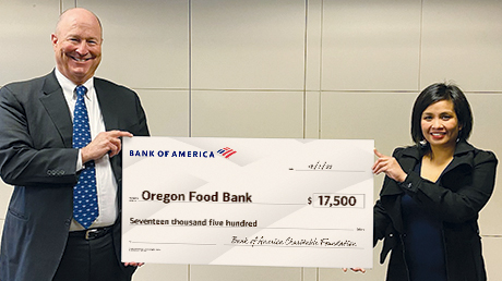 Bank of America employees presenting donation check