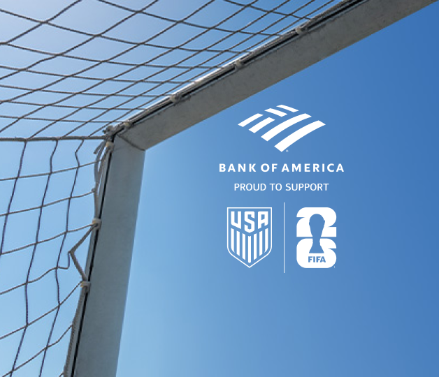A soccer goal in front of a bright blue sky, along with Bank of America, US Soccer, and FIFA World Cup logos.