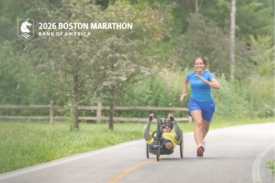 Two athletes, one recumbent cycler and one runner, and one having a friendly race on a path