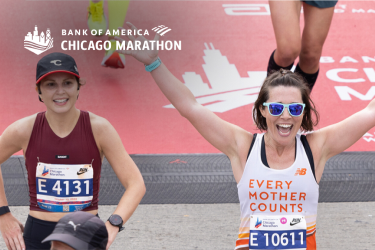 Two runners crossing the finish line at the Chicago Marathon