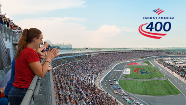Spectators overlook a crowded racetrack during the Bank of America 400 race.