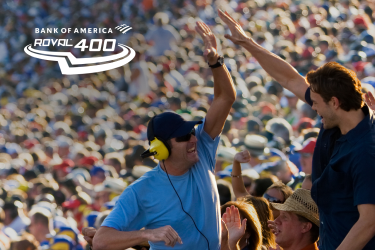 Two fans high five in NASCAR crowd