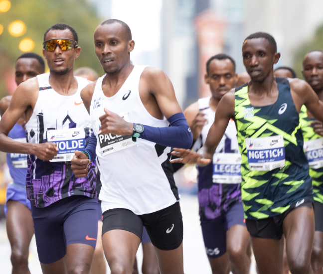 Marathon runners in full stride