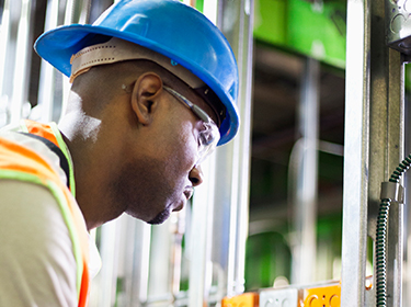 worker man using drill