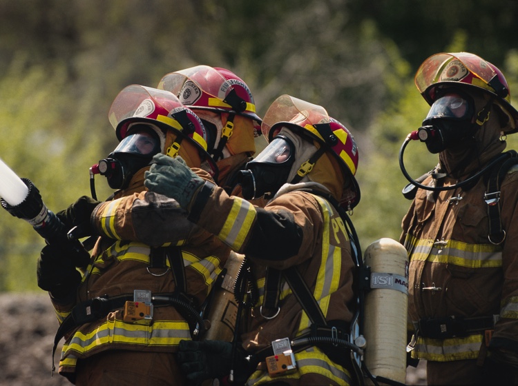 Group of firefighters in full gear
