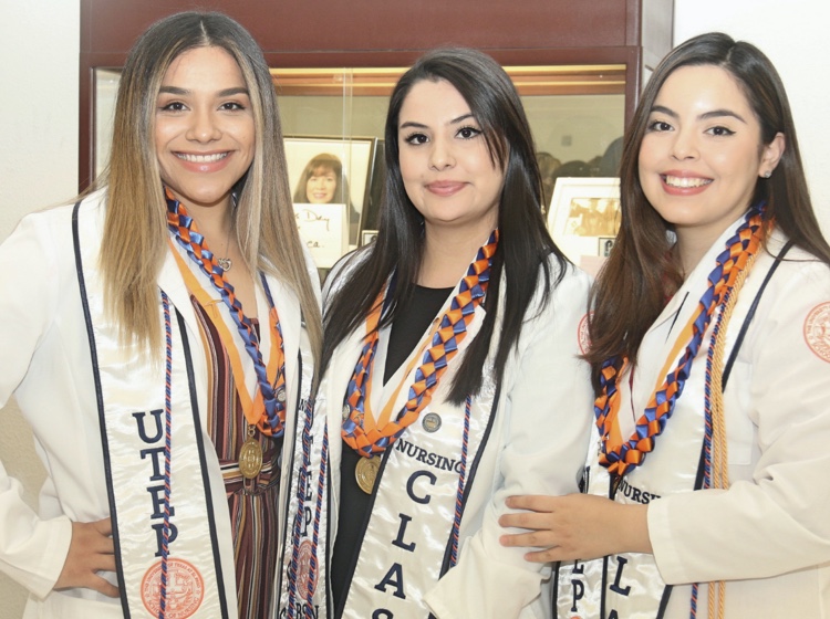Three female nursing school graduates