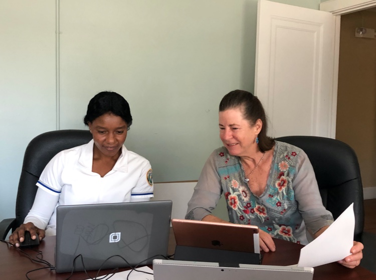 Two women working together