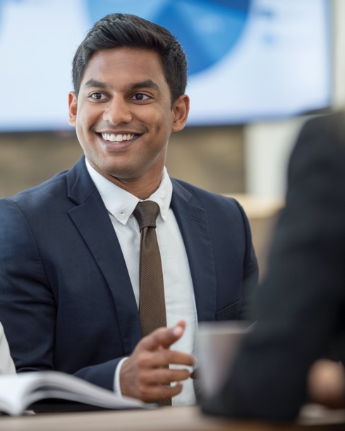 Man in suit smiling