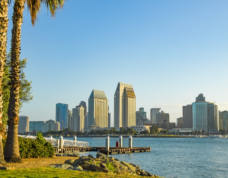 Skyline of San Diego through rocks and mountain