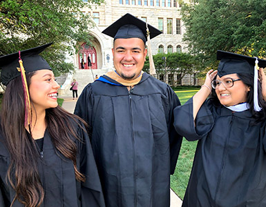 graduates smiling