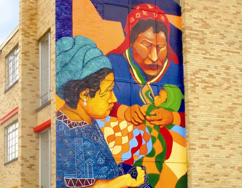 Mural showing two women and a baby