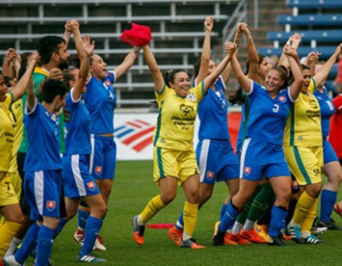 Athletes celebrate after winning a game