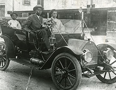 vintage picture of african american family driving car