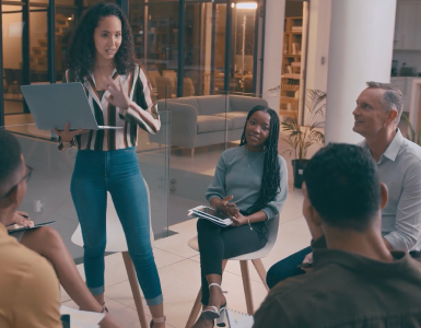 Group of people in a circle talking