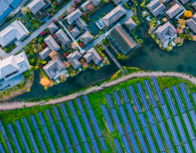 Aerial view of buildings and solar panels
