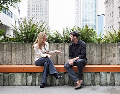 Man and woman looking at tablet